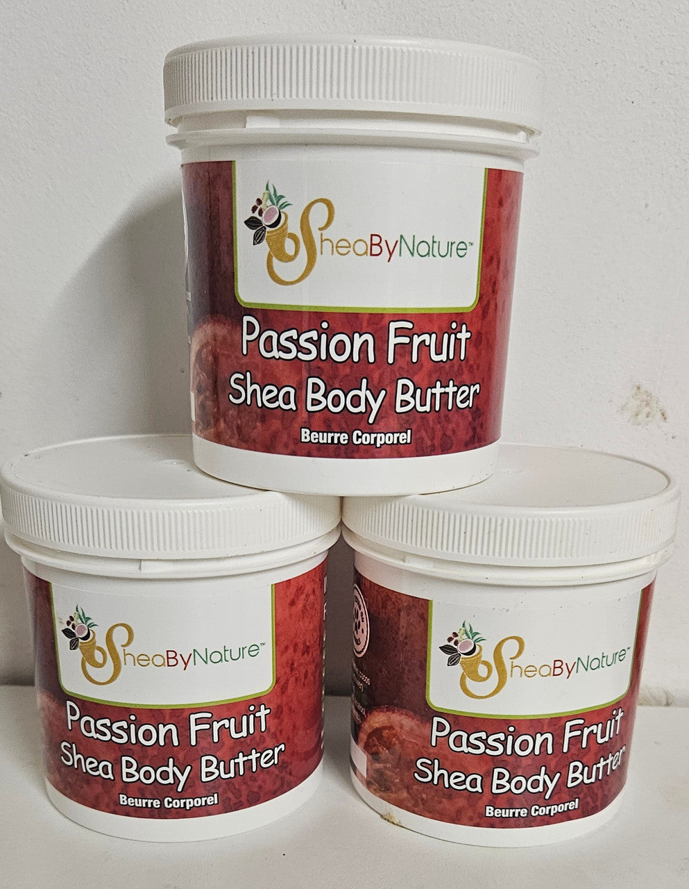 3 pots of passion fruit body butters from sheabynature skincare.