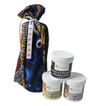 Three containers of body butter with a decorative bag on a white background